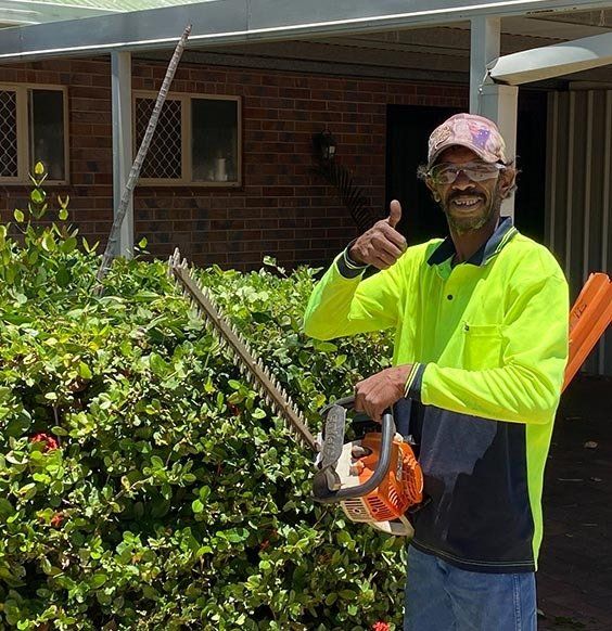 Man Trimming Hedge — Hedge Trimming in Mount Isa, QLD