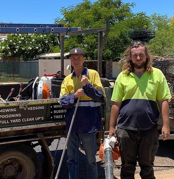 Two Man Standing with Track — Rubbish Removal in Mount Isa, QLD