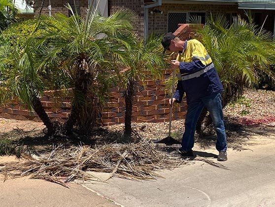 Man Cleaning The  Yard— Yard Clean-ups in Mount Isa, QLD