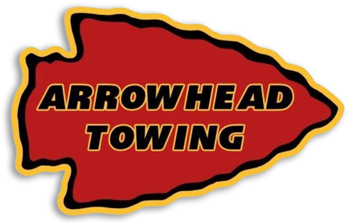 Arrowhead towing logo with a red arrow in the middle