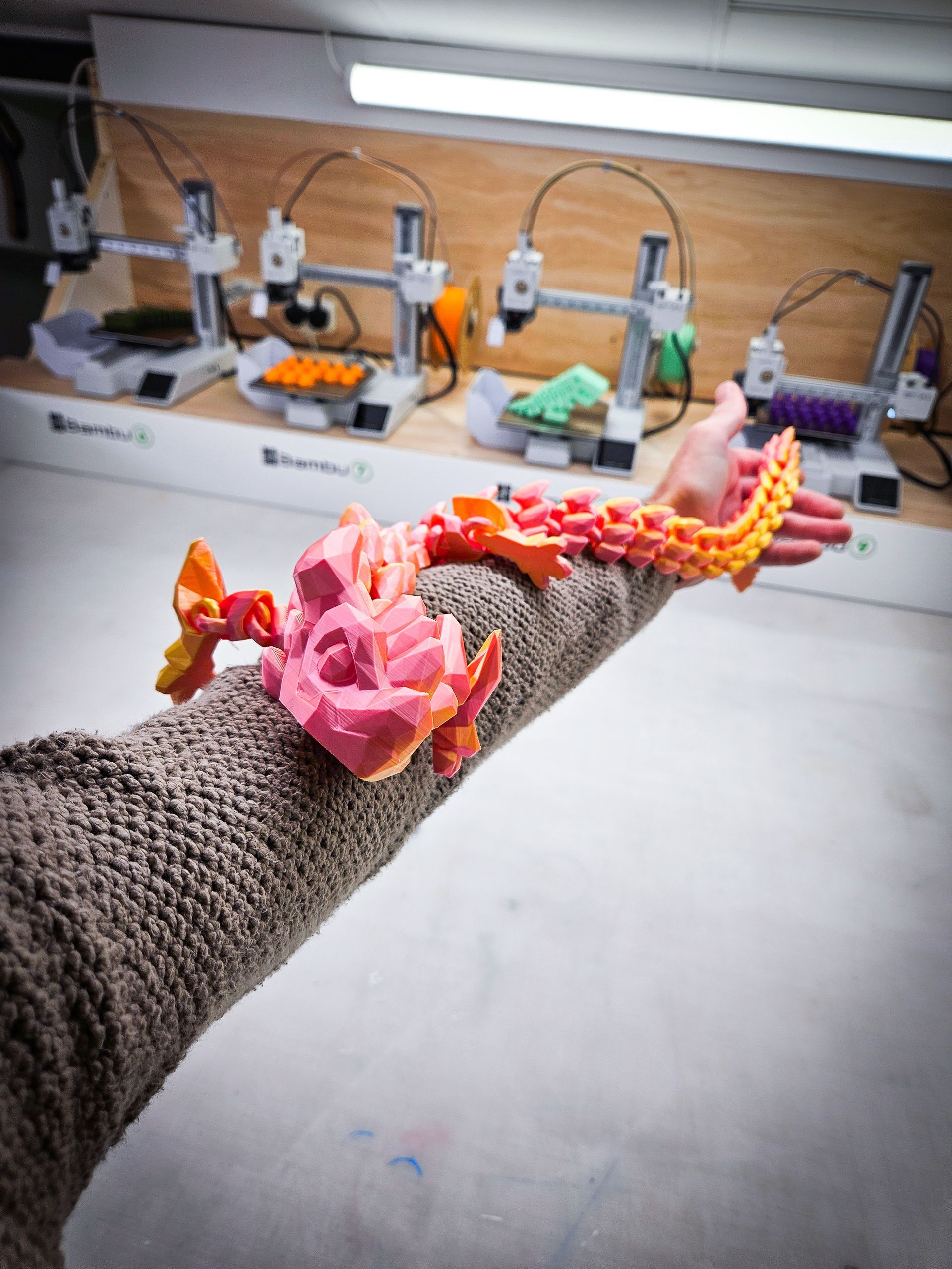 A person 's arm with a bunch of bracelets on it