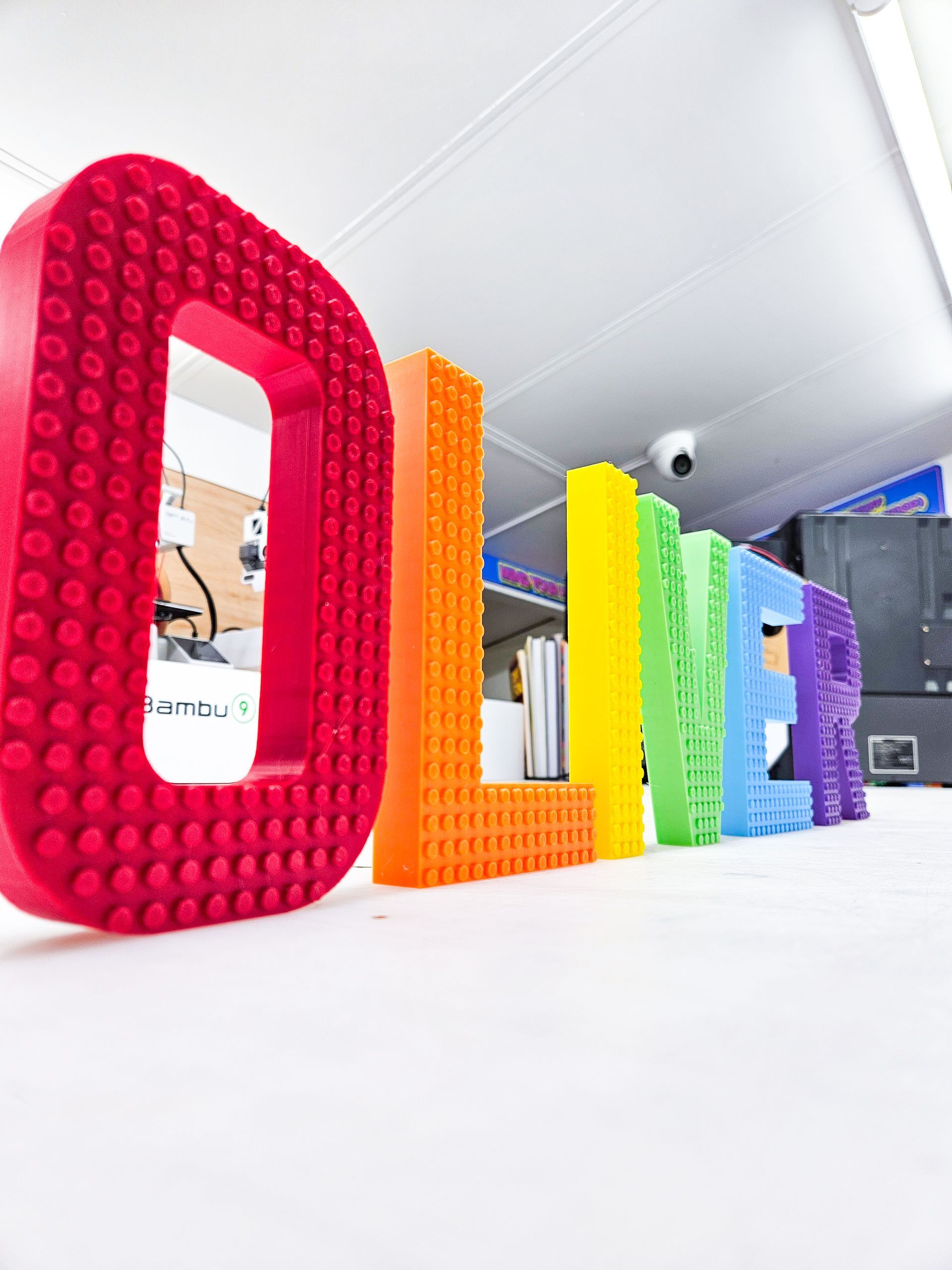 A row of colorful letters spelling out the word olier