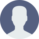 A silhouette of a man 's head in a circle.