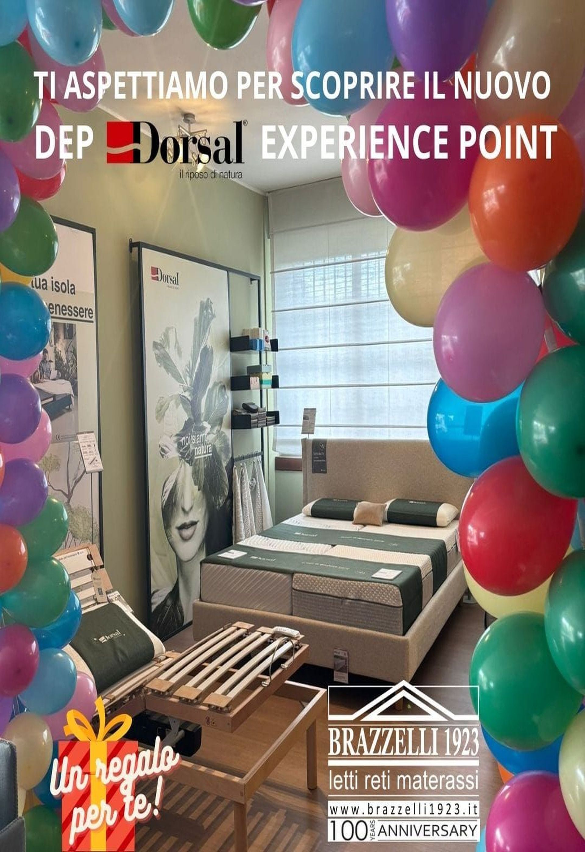 Foto promozionale di un Dorsal Experience Point in un negozio di mobili, circondato da palloncini.