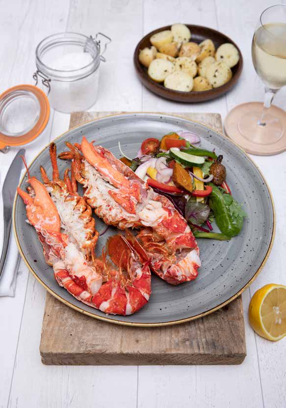 Bring a large pan of water to the boil. Add the thyme, orange halves, sliced onion, mint, star anise, cardamon, peppercorns, salt and cloves. Place the lobster in the boiling water and cook for 15 minutes per 1kg of lobster.  Once cooked, refresh the lobster in cold water and then prepare.Salad - make the dressing by mixing together the oil, vinegar, zest and juice of the lemons and a pinch of sea salt. When you are ready to serve add the dressing to the salad ingredients.Potatoes - put a generous knob of butter in a saucepan with the seaweed and lemon zest and juice. Leave to infuse for 1 hour on a low heat then blend until it is smooth.Put the new potatoes into boiling water with 4 sprigs of fresh mint, the halved lemon and plenty of sea salt.  Leave to cook for 25 minutes then drain and toss in the lemon and seaweed dressing.