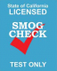 A blue sign that says smog check test only