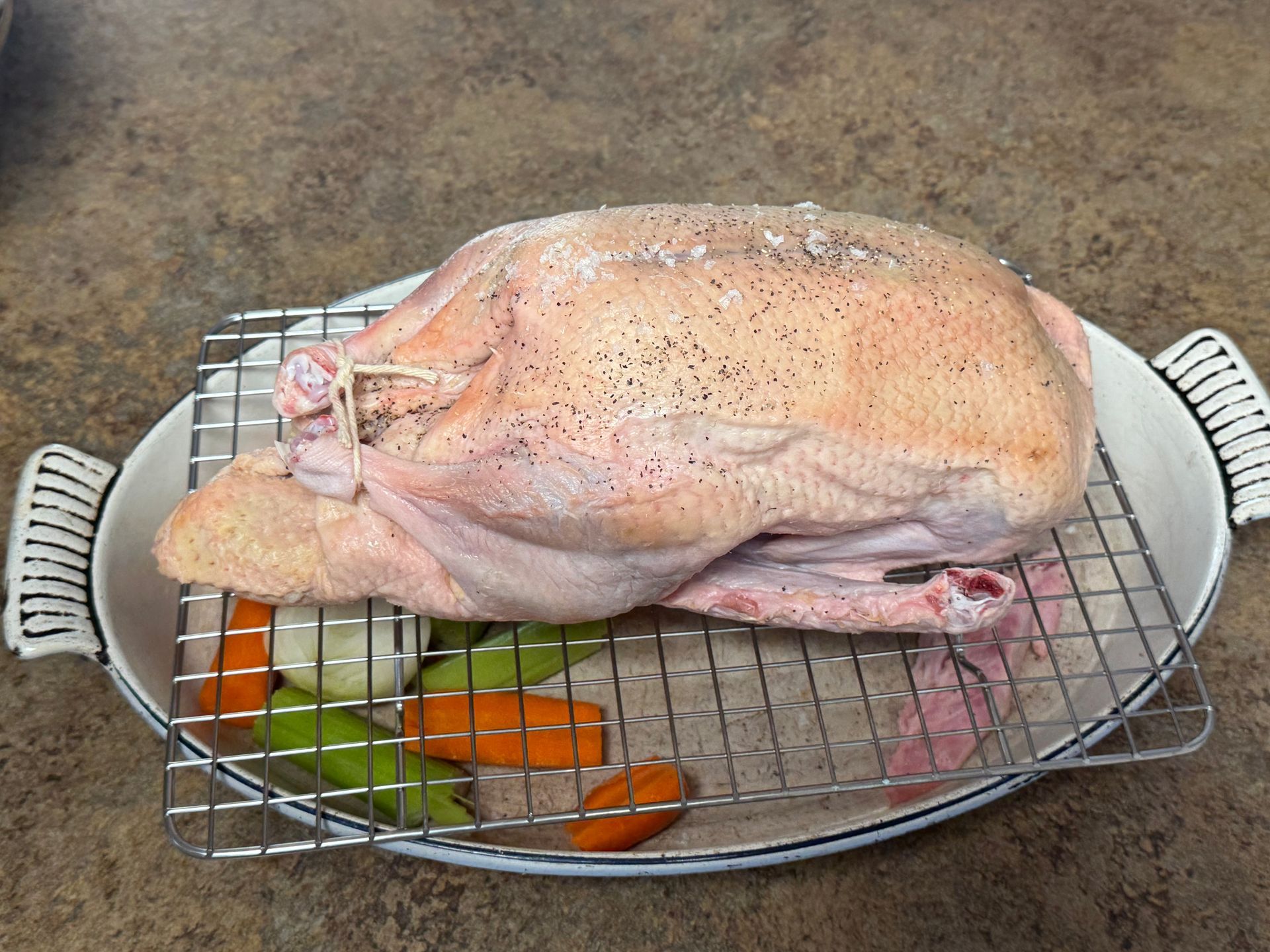Three bowls of brussels sprouts are sitting on a table.