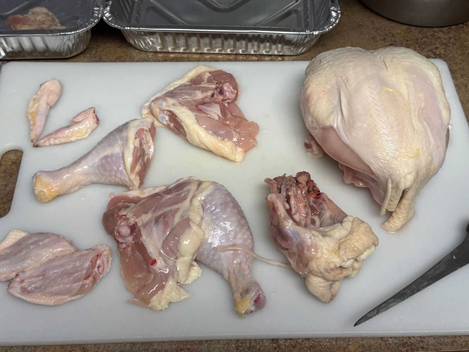 A pan filled with clams , onions , celery , and other ingredients.