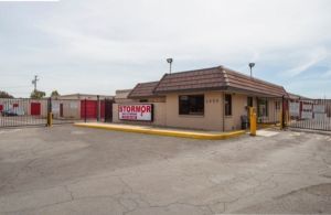 A small building with a sign that says storage on it