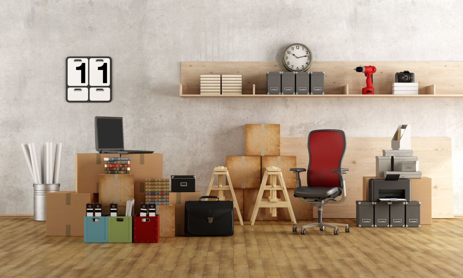 A room filled with boxes , a chair , a laptop , and a clock.