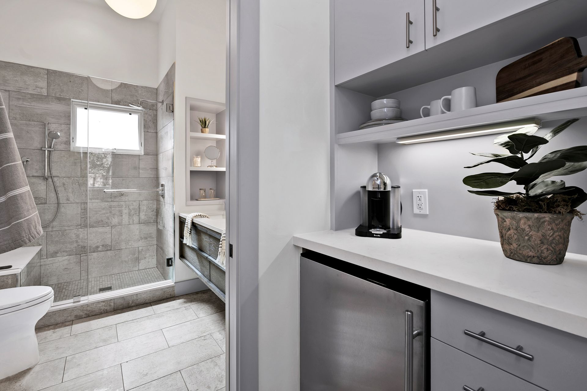 A bedroom with a king size bed and a chair