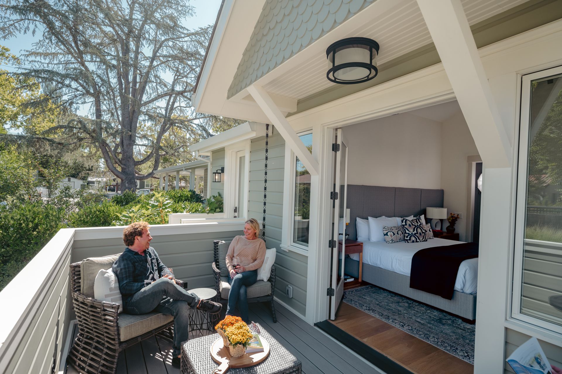 The front of a house with a porch and stairs