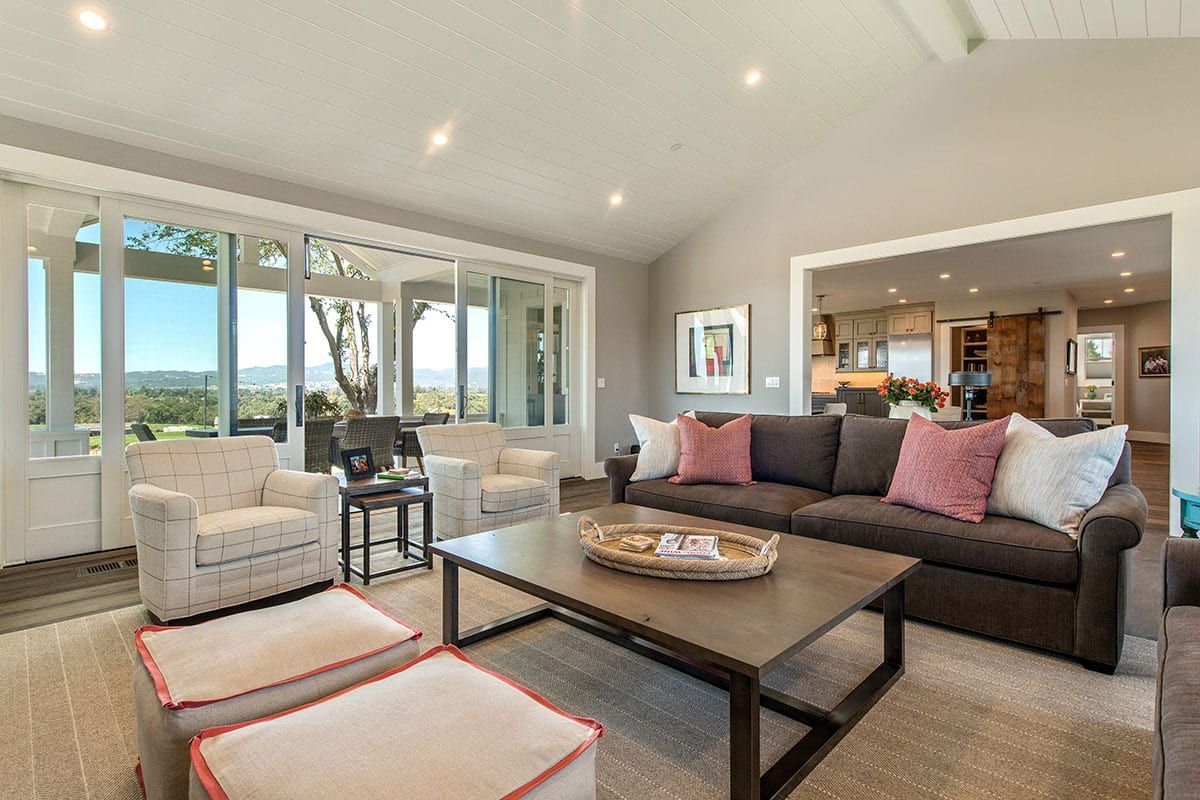 A living room filled with furniture and a coffee table.