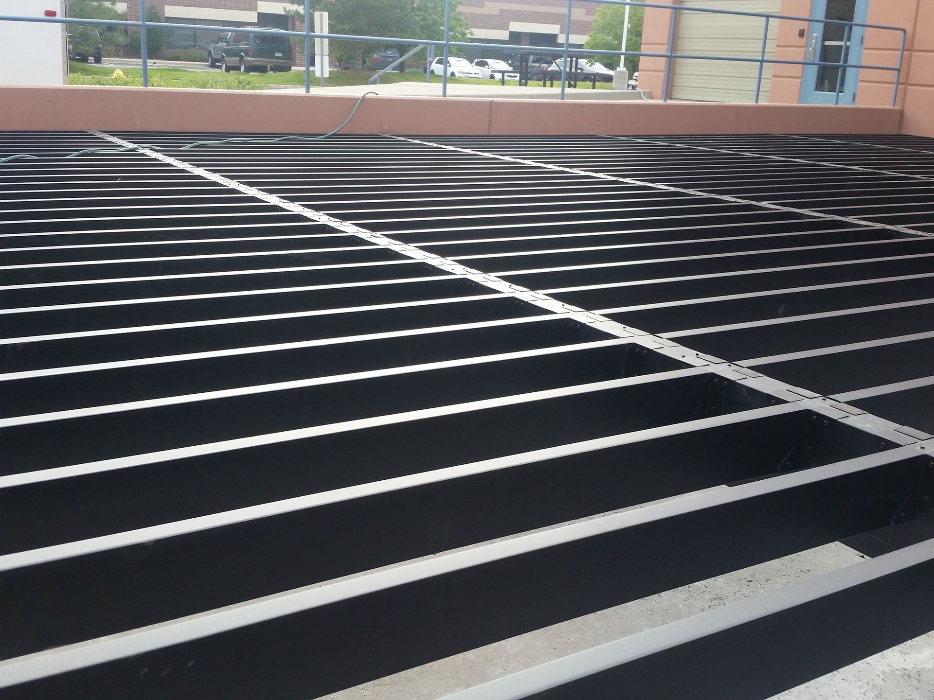 A black and white parking lot with white lines