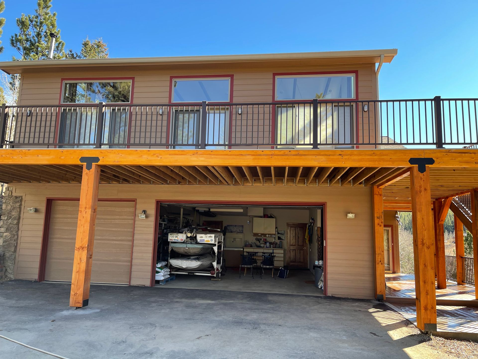A large house with a garage and a balcony