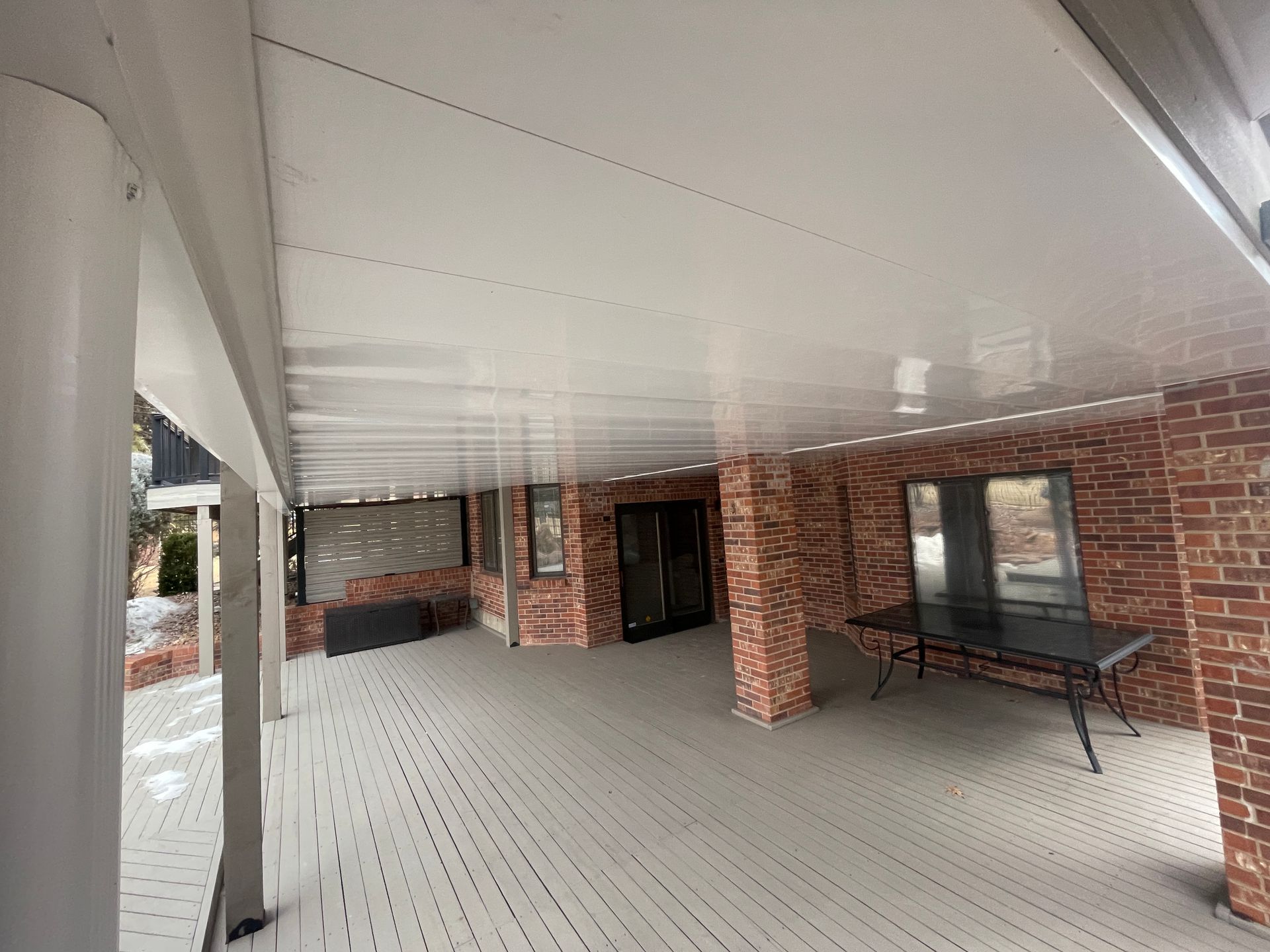 The underside of this large deck has a water collection system expertly installed and it looks great from underneath.