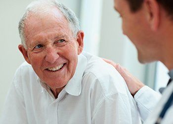 Old Man Talking to Doctor – Family Doctor in Ocean City, NJ