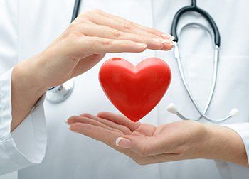 Doctor Holding Heart – Medical Practice in Ocean City, NJ