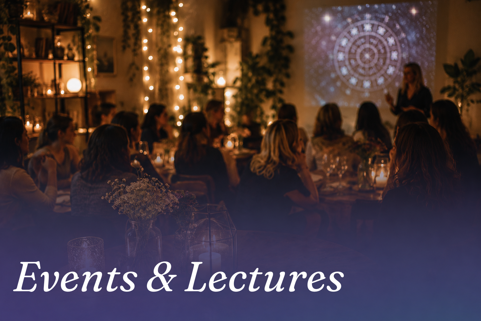 Events & Lectures banner showing a dimly lit audience at tables with warm string lights and a mandala projection.