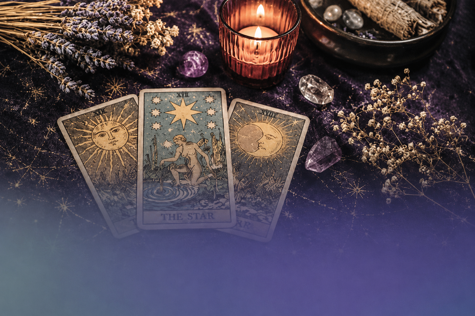 Tarot cards beside a lit candle, crystals, and dried flowers on a dark, moody table.
