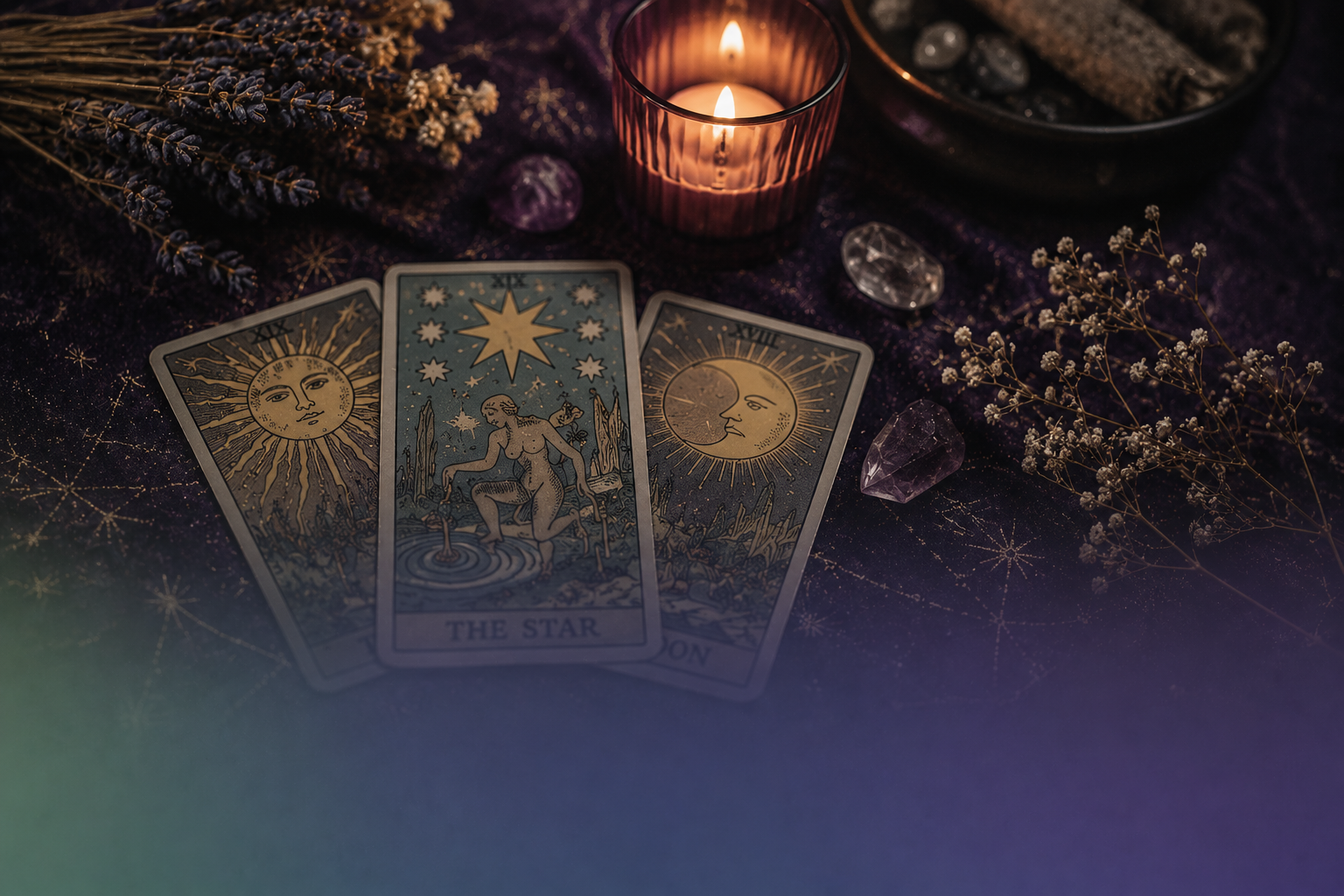 Tarot cards beside a lit candle, crystals, and dried flowers on a dark, moody table.