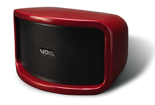 A red void speaker is sitting on a white surface