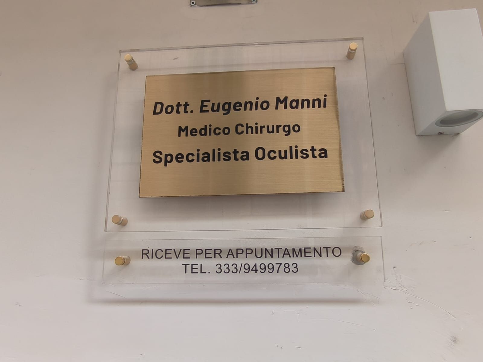 Dott eugenio Manni Specilista oculista targhetta