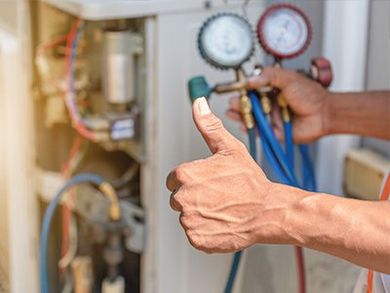 Technician Thumbs Up — Kalamazoo, MI — Suburban Heating & Air Conditioning