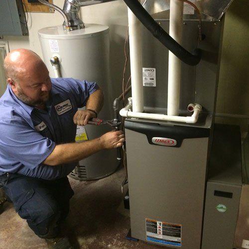 A professional doing heating installation in Kalamazoo, MI