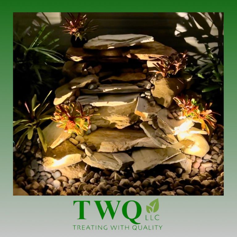 A logo for two llc that says treating with quality