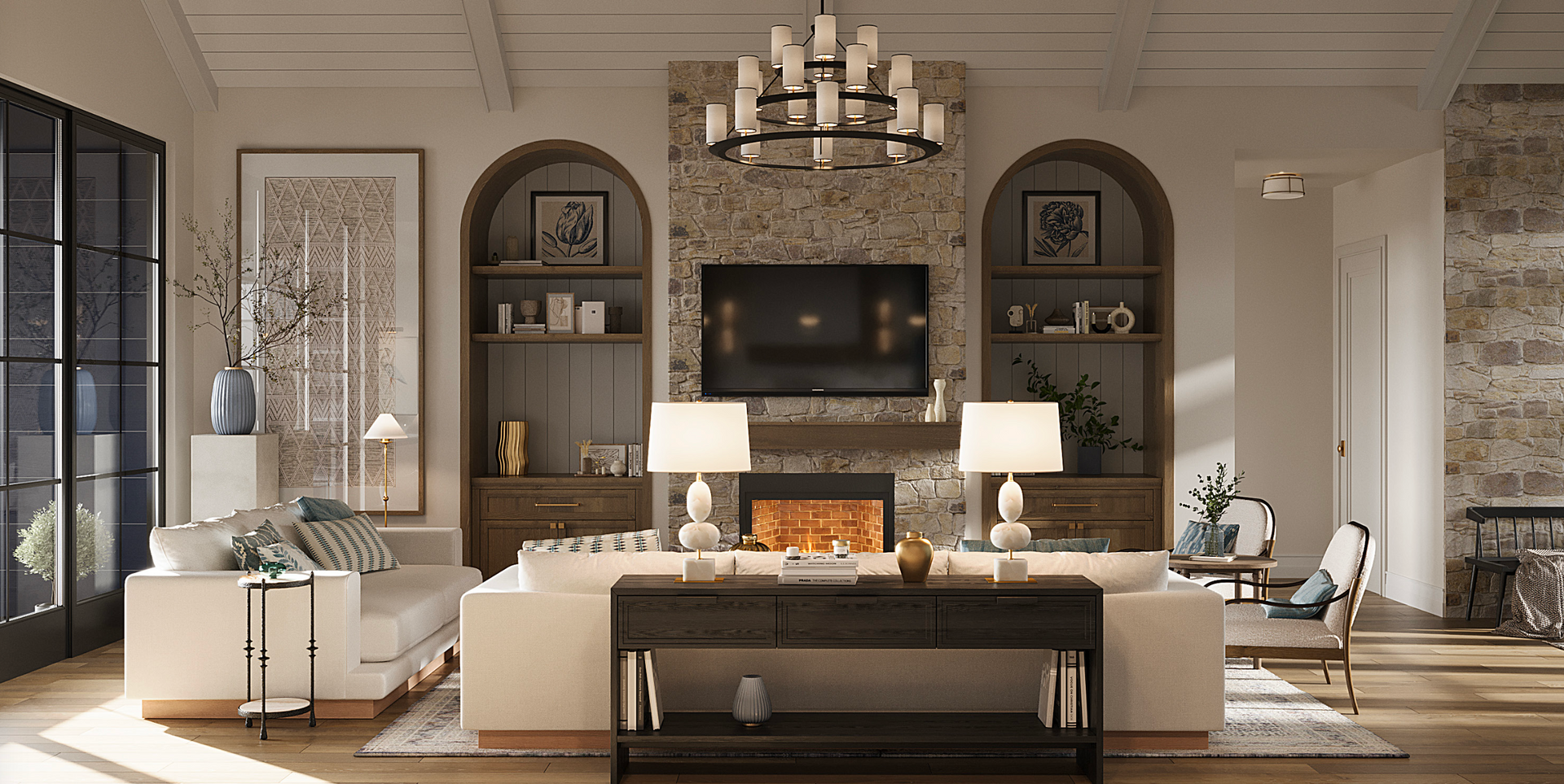 A spacious, neutral-toned living room featuring a fireplace with a mounted television and arched wooden built-in shelves.