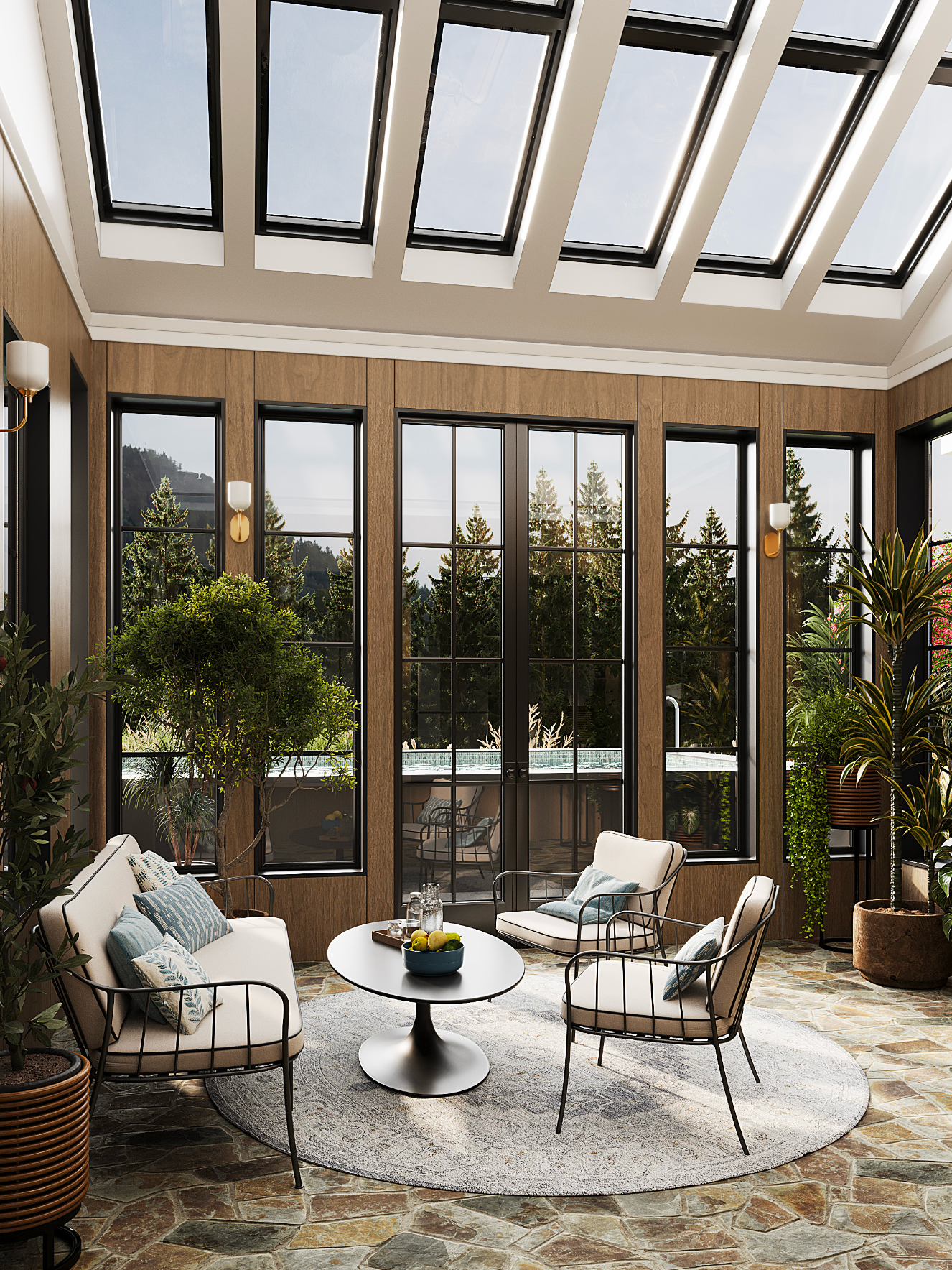 A sunroom with a glass-paneled ceiling, black-framed windows, a cream sofa, two armchairs, and a round coffee table.