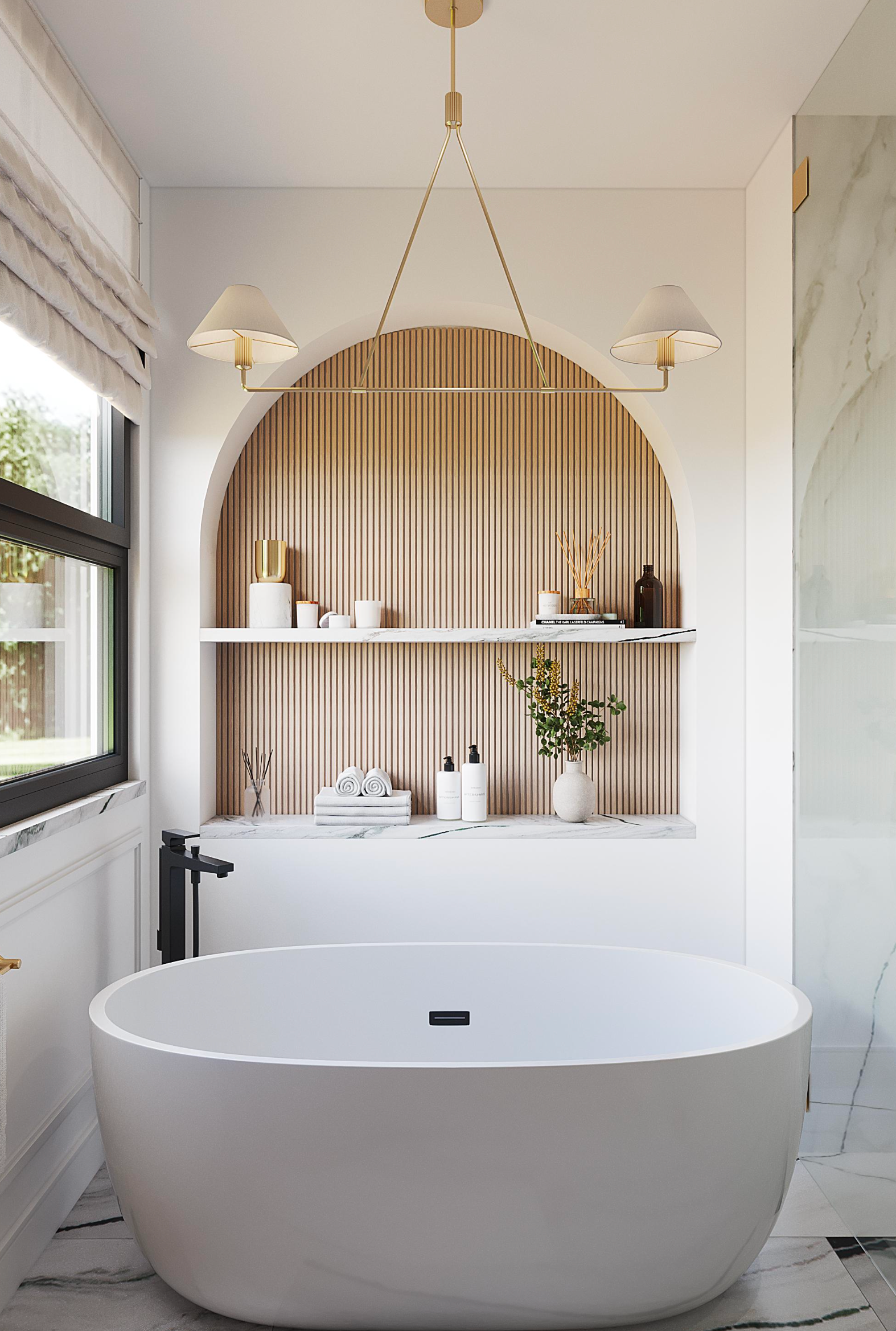 A white freestanding bathtub sits before an arched wall niche with vertical wood slats, white marble shelves, and lights.