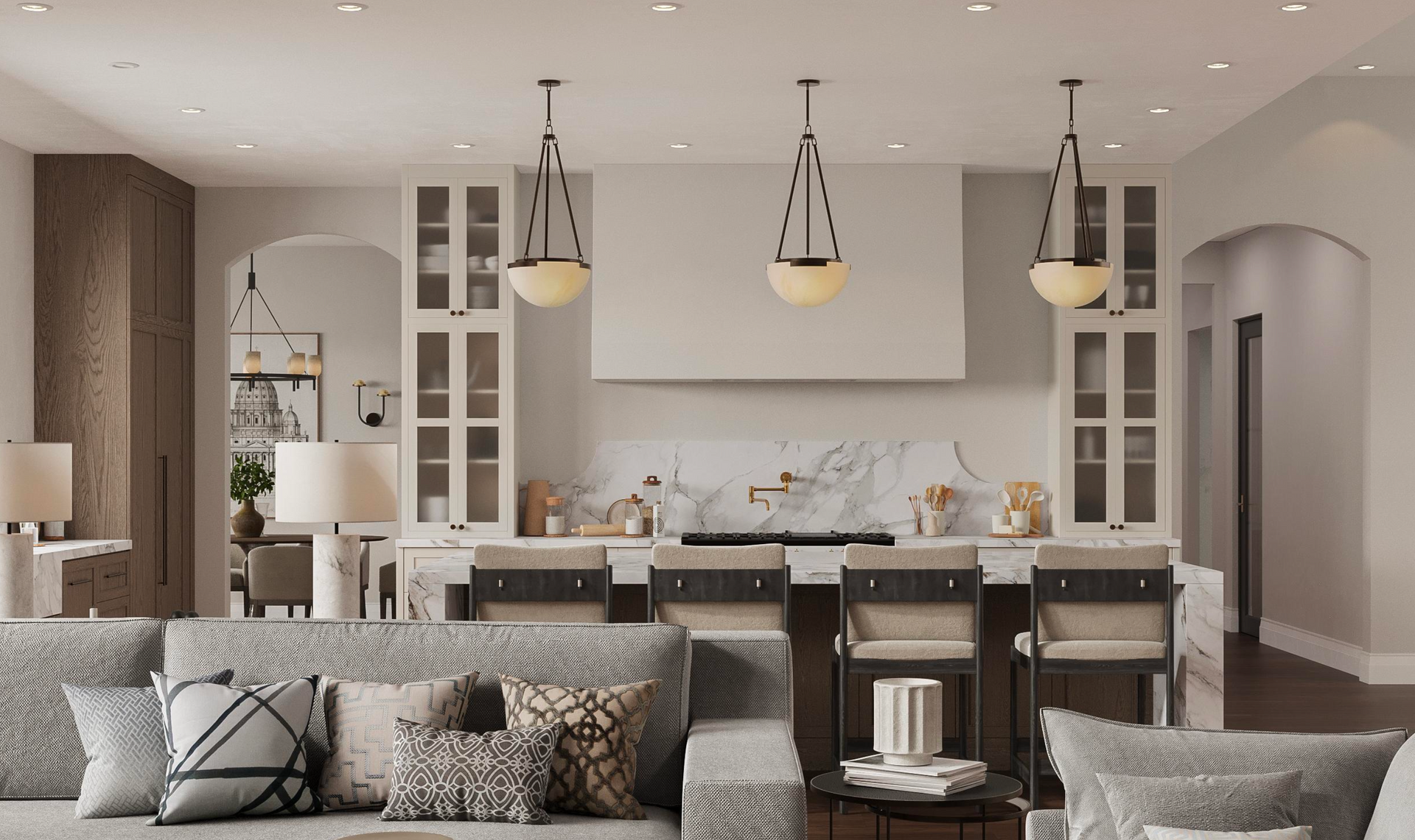 An open-concept room features a kitchen with marble backsplash and island, three pendant lights, and a plush grey sofa.