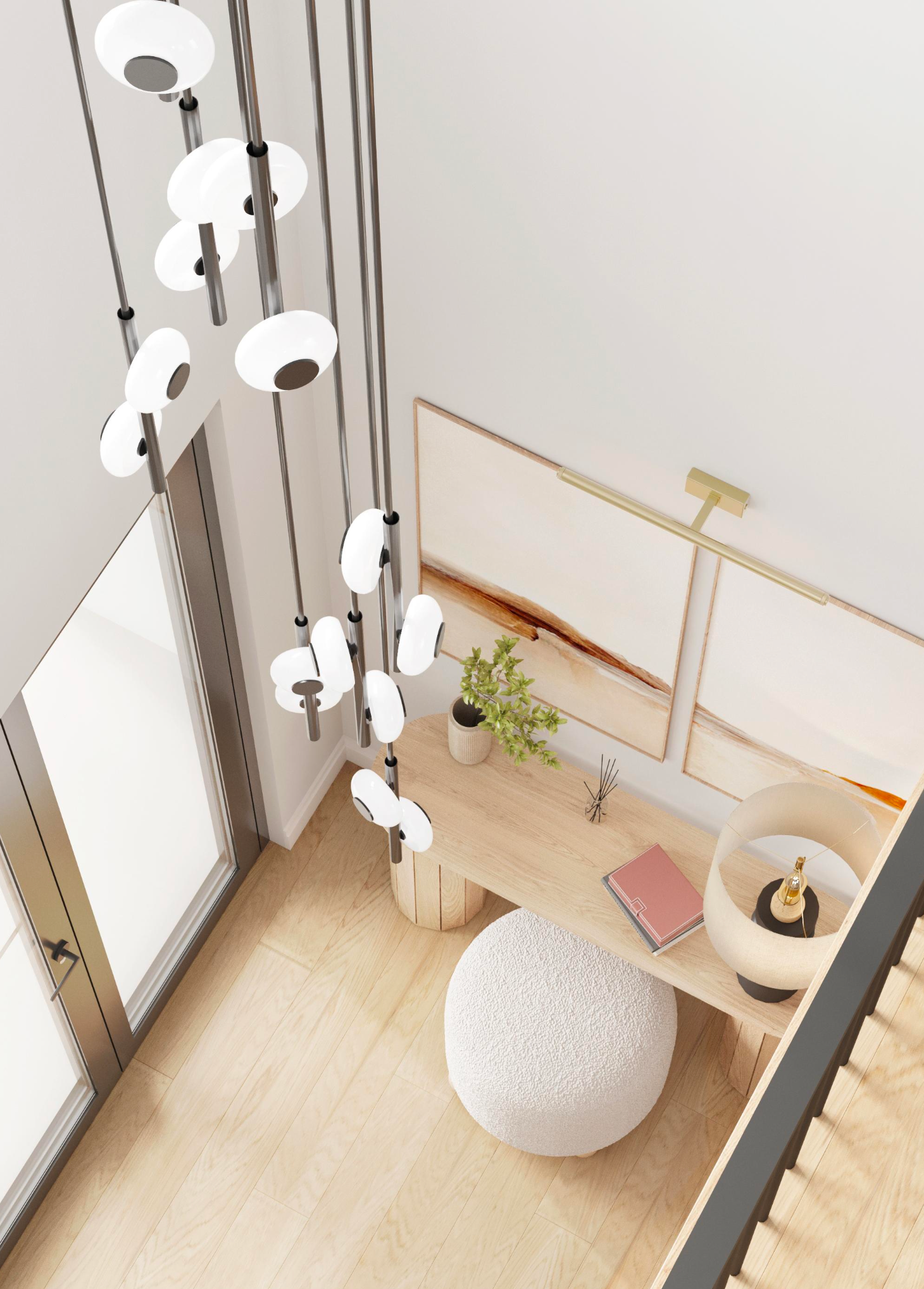 High-angle view of a modern nook with a wood desk, fuzzy stool, linear wall art, a table lamp, and a multi-bulb chandelier.