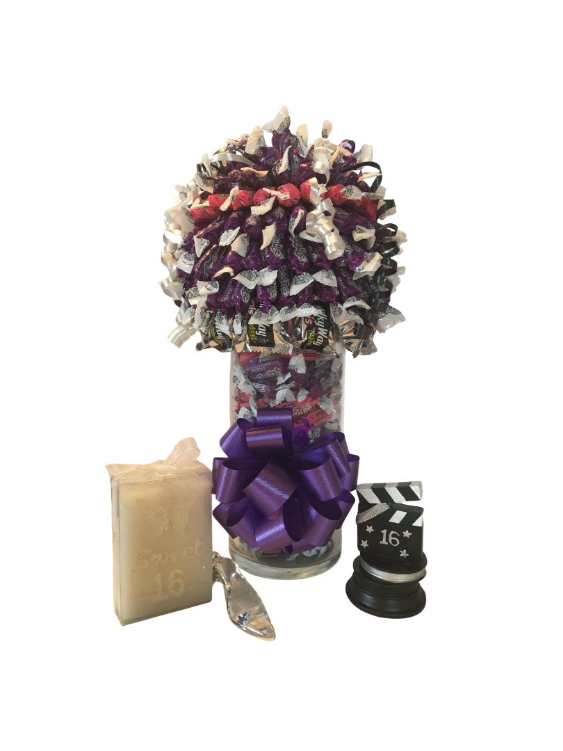 There are many different types of candy on the table.