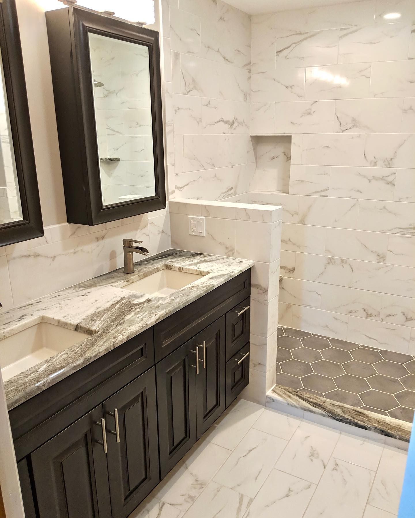 New bathroom with walk in shower and double sink