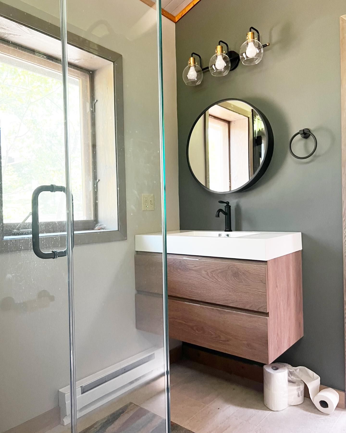 New modern bathroom with sink and shower