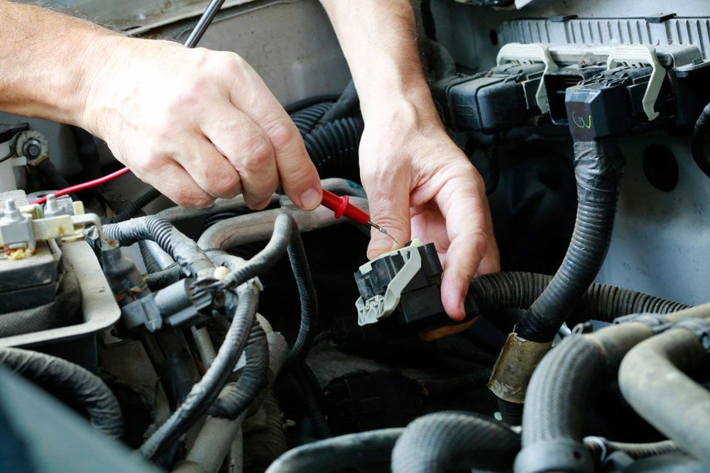 Mechanic Checking Car — Mobile Auto Electrician In Robina, QLD