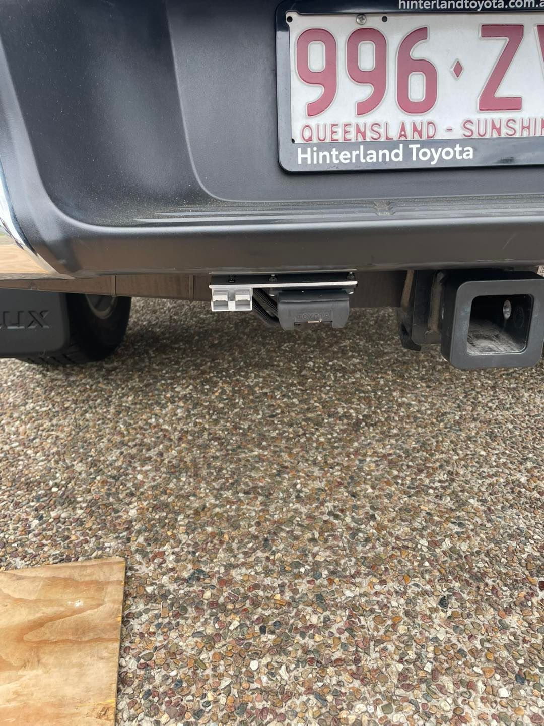 Rear of a Car With a Tow Hitch and License Plate — Glenn Rowe Auto Electrics In Coolangatta, NSW