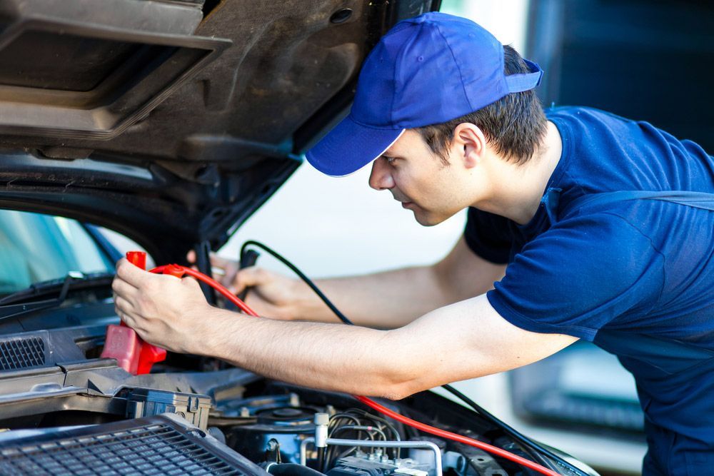 Professional Car Mechanic Working Repair Car  — Trailer & Caravan Electrician In Tweed Heads, QLD