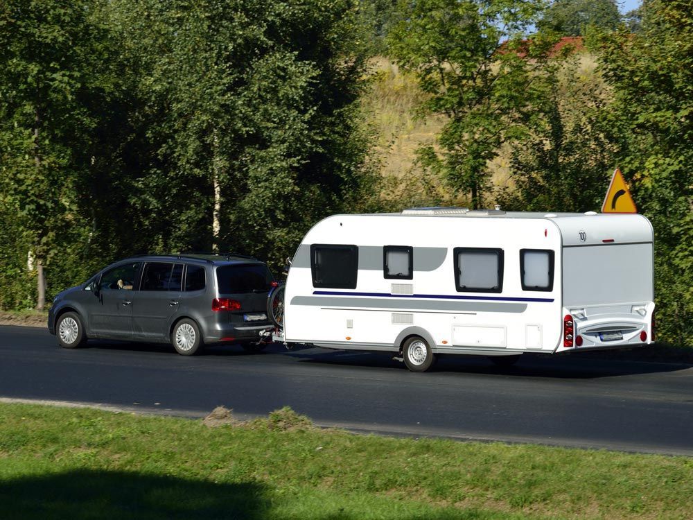 Car With Caravan — Mobile Auto Electrician In Tweed Heads, QLD