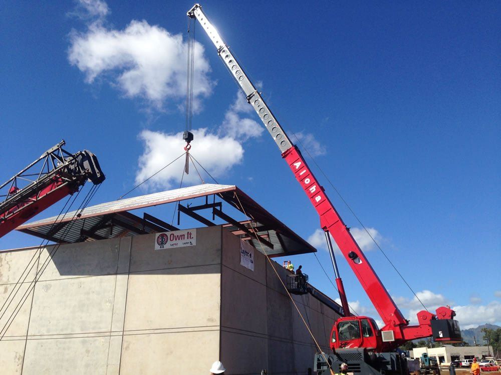 Crane Lifting Roof — Lihue, HI — Aloha Equipment Rentals