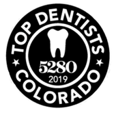A black and white logo for top dentists in colorado