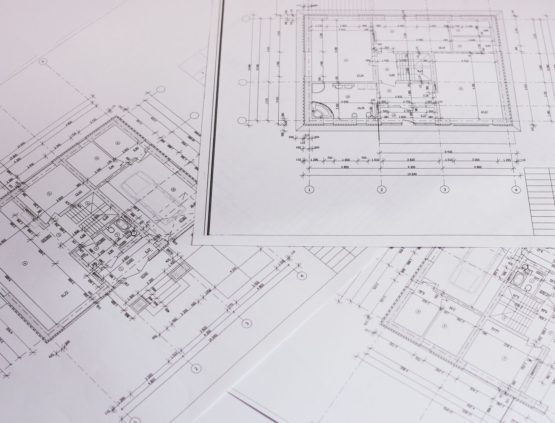 Architectural blueprints, detailed floor plans, and elevation drawings.