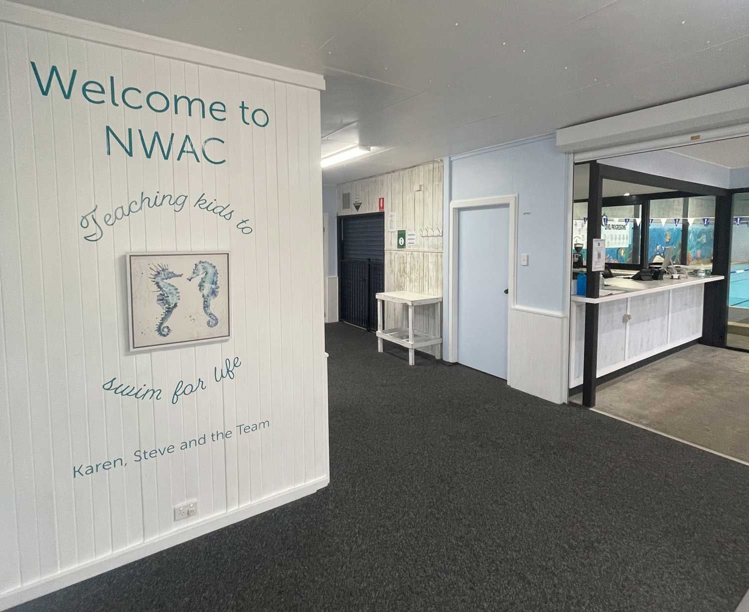 A Hallway With a Sign on the Wall — North Wyong Aqua Centre In Wyong, NSW