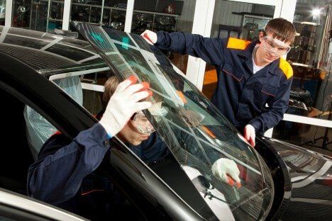 Two Men Installing Car Glass — Auto Glass Replacement in Marion, NC