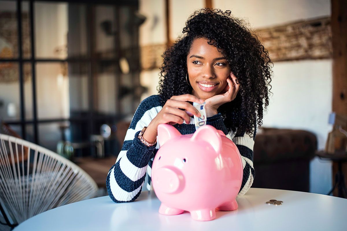 woman with saving piggy bank