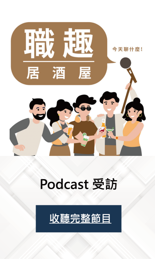 A group of people are standing next to each other in front of a microphone.