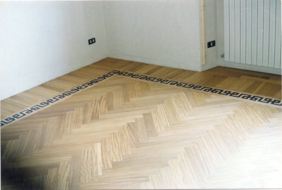 pavimento a intarsio a spina di pesce